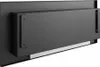 The back of a black bioethanol fireplace insert is shown, mounted on a black panel. Náhled obrázku produktu