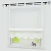 A white sheer Roman blind with lace trim hangs on a window, with a small wooden horse figurine on the windowsill. Produktbild-Vorschau