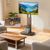 A TV stand with a TV on it, placed in a living room setting with furniture and a plant. Anteprima dell’immagine prodotto