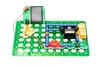 A science experiment kit with various electronic components connected on a green base. Podgląd zdjęcia produktu