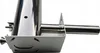 A close-up, side view of a stainless steel smoke generator on a white background. Produktbild-Vorschau