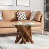 A living room scene with a couch, coffee table, and rug. Produktbild-Vorschau