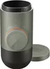 A portable espresso maker and its lid are shown against a white background. Produktbild-Vorschau
