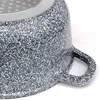 A close-up view of the speckled exterior and handle of a pot. Produktbild-Vorschau