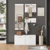A hallway or entryway with a white furniture set including a mirror, shelves, coat hooks, and a shoe cabinet, along with decorative items and umbrellas. Produktbild-Vorschau