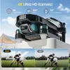A drone with its camera prominently displayed, with inset images showing video footage. Produktbild-Vorschau