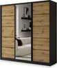 A wardrobe with sliding doors and a mirror, reflecting a living room scene. Produktbild-Vorschau