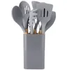 A set of gray silicone kitchen utensils in a gray holder. Náhľad obrázku produktu