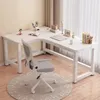 A white L-shaped desk with a chair in a room with light-colored walls and curtains. Podgląd zdjęcia produktu