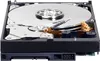 An open hard disk drive is shown from a slightly elevated angle against a white background. Náhled obrázku produktu