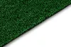 A close-up, angled view of artificial grass on a white background. Podgląd zdjęcia produktu