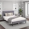 A bedroom scene with a bed as the main focus. Voir les images du produit