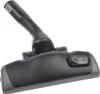 A vacuum cleaner floor head with a handle, shown against a white background. Produktbild-Vorschau