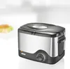 A product shot of a deep fryer against a blurred background. Produktbild-Vorschau