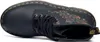 A top-down view of a black Dr. Martens boot with floral embroidery. Produktbild-Vorschau