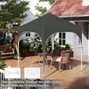 A gray pop-up canopy tent is set up on a wooden deck, surrounded by outdoor furniture and greenery. The image also includes inset graphics of tent stakes and ropes. Produktbild-Vorschau