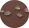 A close-up view of water droplets on a brown, textured fabric. Anteprima dell’immagine prodotto