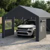 A white SUV is parked inside a gray carport tent. Produktbild-Vorschau
