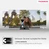 Three televisions are displayed, with the front television showing a family enjoying themselves outdoors. The Thomson logo is visible at the top right, and warranty information is displayed at the bottom. Produktbild-Vorschau