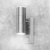 A modern, silver-colored outdoor wall lamp with a motion sensor, mounted on a textured gray wall. Produktbild-Vorschau