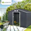 A dark gray metal shed with an open door, set in a garden with a wheelbarrow full of flowers and gardening tools. Produktbild-Vorschau