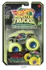 A Hot Wheels Monster Truck toy in its packaging, with a glow-in-the-dark theme. Voir les images du produit
