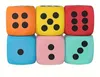 Six large dice in different colors arranged in two rows of three. Produktbild-Vorschau