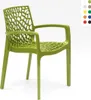 A green plastic chair with a web-like design on the back and seat, shown against a white background. A small color swatch chart is visible in the top right corner. Voir les images du produit