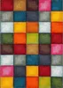 A close-up, flat lay view of a multicolored checkered rug. Produktbild-Vorschau