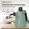 A green steam cleaner is shown with text and icons detailing its features, set against a blurred background of a living room. Produktbild-Vorschau