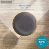 A top-down view of a round, gray cushion with a wooden rim, placed on a light wooden floor. Text overlays provide product dimensions and washing instructions. Produktbild-Vorschau