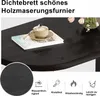 A close-up of a dark wood-grain table surface with a cup of coffee on a book. Produktbild-Vorschau