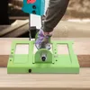 A person wearing gloves is using a chainsaw with a guide attachment to cut wood. Náhled obrázku produktu