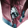 A close-up view of a smartphone being placed into a pocket on a backpack. Produktbild-Vorschau
