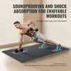 A man is performing a plank exercise on a black mat with dumbbells. Produktbild-Vorschau