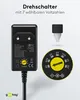 A product shot of a Goobay universal power supply with a close-up of its voltage selector dial and a key for the dial. Náhľad obrázku produktu