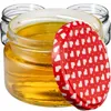 Three glass jars filled with honey, one with a red lid decorated with white hearts. Produktbild-Vorschau