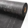 A roll of black fabric material, likely for construction or roofing, is shown diagonally against a white background. Podgląd zdjęcia produktu