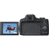 The back of a Canon PowerShot SX50 HS digital camera with its LCD screen flipped out and displaying an image of a red biplane. Produktbild-Vorschau