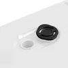 A close-up view of a white planter with a black rubber stopper. Produktbild-Vorschau