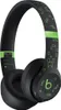 A pair of black Beats By Dre Solo 4 headphones with a Minecraft-themed green pixelated design. Produktbild-Vorschau
