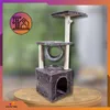 A cat tree is displayed on a wooden surface with a blurred green background. A circular graphic with a cat tree icon is in the upper left corner. Náhľad obrázku produktu