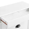 A close-up view of an open drawer on a white wooden cabinet. Produktbild-Vorschau