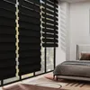 A bedroom scene with a bed and blinds. Voir les images du produit