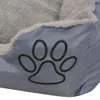 A close-up of a dog bed with a paw print design. Produktbild-Vorschau