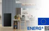 A black refrigerator is shown in a modern kitchen setting with bar stools and a counter. Produktbild-Vorschau