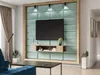 A modern living room with a wall-mounted TV and entertainment unit. Náhľad obrázku produktu