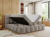 A bed with its storage compartment open, showing the mattress and internal storage space. Produktbild-Vorschau