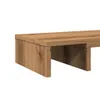 A close-up view of a wooden monitor stand. Podgląd zdjęcia produktu