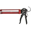 A red and black caulking gun is shown against a white background. Podgląd zdjęcia produktu